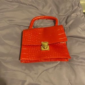 red and gold purse
